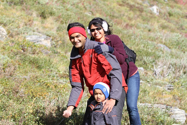 Family portrait eating wild blueberries