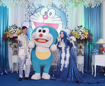 dekorasi pernikahan doraemon terbaru