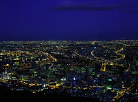 An aerial view of the lights of South Africa's Cape Town at night.