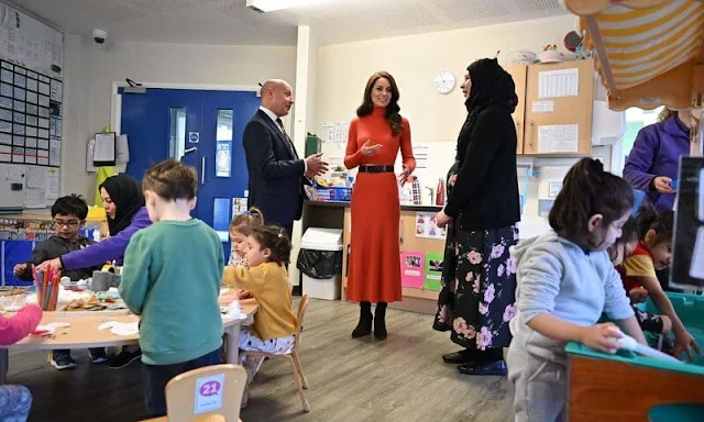 Princess of Wales wore a Peppe cashmere and silk sweater and Epper skirt by Gabriela Hearst. Massimo Dutti cashmere wool coat