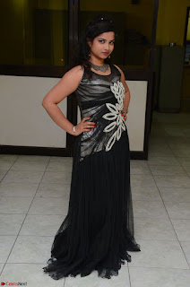 Shrisha Dasari in Sleeveless Short Black Dress At Follow Follow U Audio Launch 011.JPG