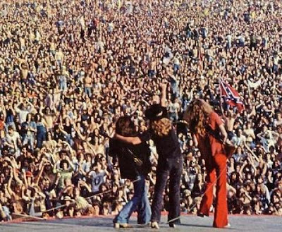 Lynyrd Skynyrd... This is so awesome... they opened up for the Rolling Stones back in 1976. The stage had a really large tongue-shaped portion that reached out into the crowd. And as per The Stones... LS were NOT to enter out onto that portion of the stage for ANY reason! And well Ronnie said FUCK THAT... and ended up pushing the guys out onto the tongue during FREEBIRD. The Stones weren't very happy LoLoLoLoL "If I leave here tomorrow muthafucka!!!"