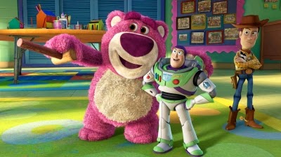 Lotso, Buzz, and Woody play games in Toy Story 3, written by Catching Fire scribe Michael Arndt.