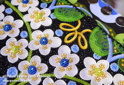 The top of Wild Child showing all outlines complete and black beaded filling underway. (Wild Child Japanese Bead Embroidery by Mary Alice Sinton)