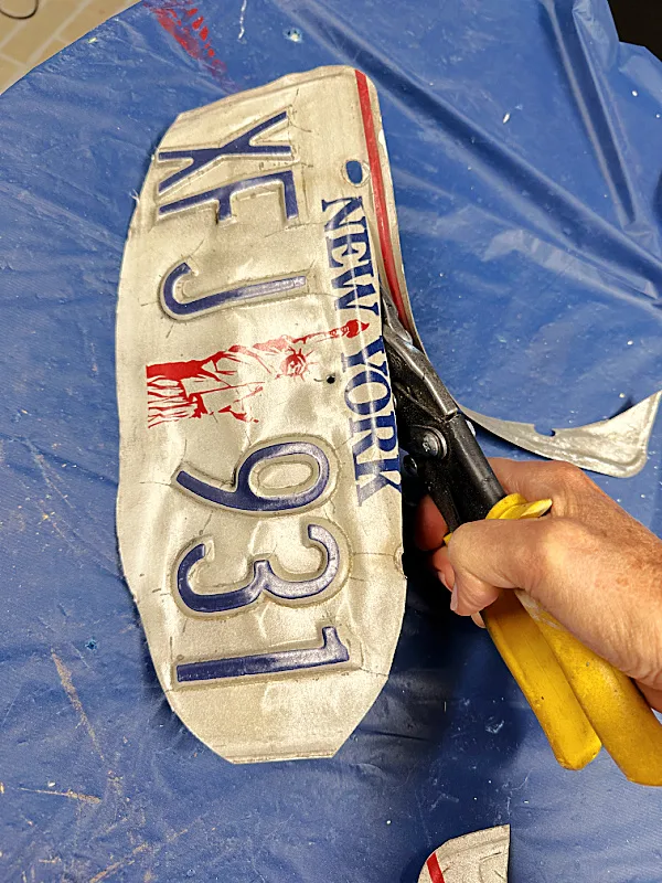 cutting license plates with tin snips