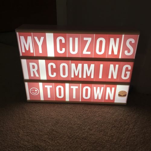light box showing text my cuzons r comming to town