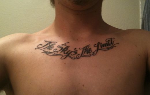 name tattoos on chest for men chest tattoos words Chest tattoos words for
