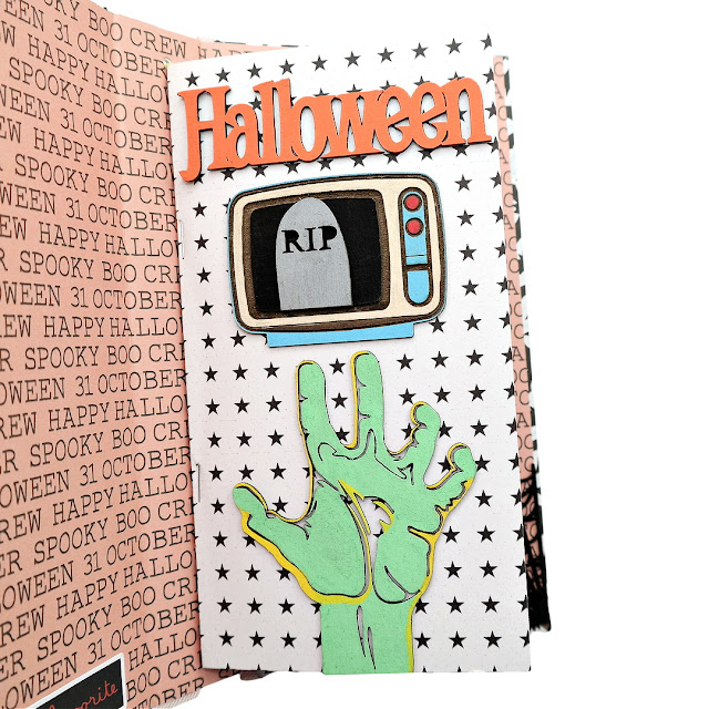 31 days of Halloween movie watchlist traveler's notebook insert chipboard embellished cover.