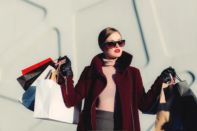 women holding new shopping bags