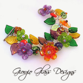 https://www.etsy.com/listing/150458289/lampwork-bead-flower-blossoms-bracelet?ref=shop_home_active