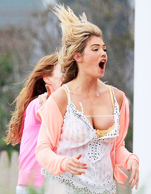 Kate Upton Risks Double Nip Slip While Jumping on Movie Set