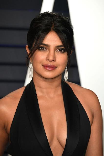 Bollywood sensation Priyanka Chopra exudes hotness in a stunning image, setting the screen on fire with her charisma and style.