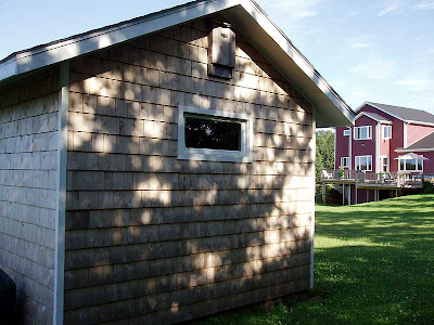 The bat box above Hubbys window was graciously returned to us by the folks who bought our old house.