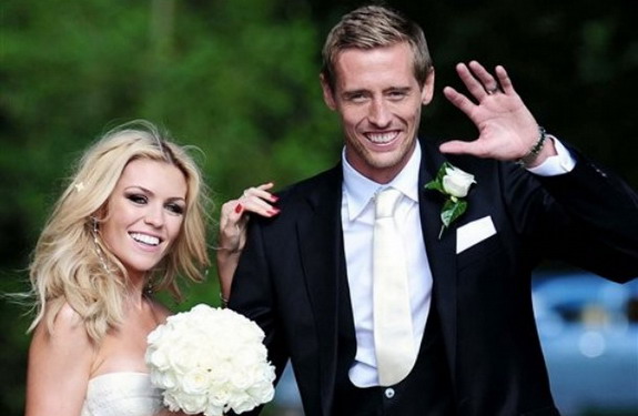 Peter Crouch and model Abigail Clancy pose together following their wedding