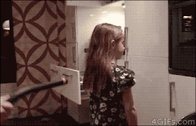 Dad makes daughter's ponytail with vacuum cleaner--gif image