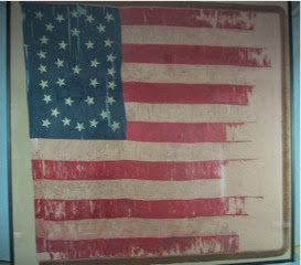 Textile conservator, flag repair expert, 34 star flag, historic, artifact, deterioration of silk