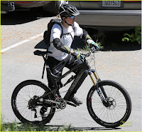 Orlando Bloom Bikes with a friend