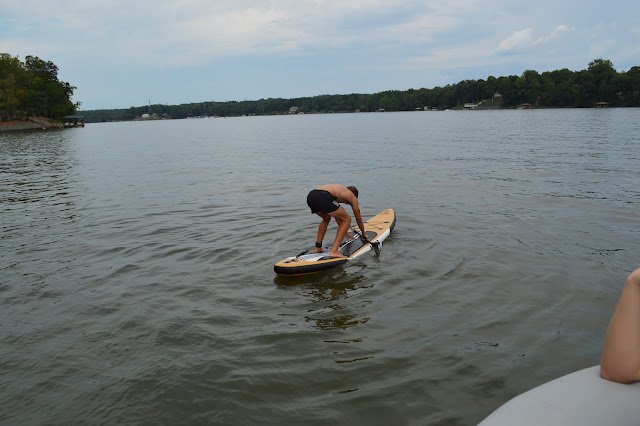 Josh standing on the paddleboard