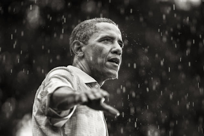 photo of President Barack Obama speaking in the rain during a campaign rally in Glen Allen, Virginia. By Brooks Kraft