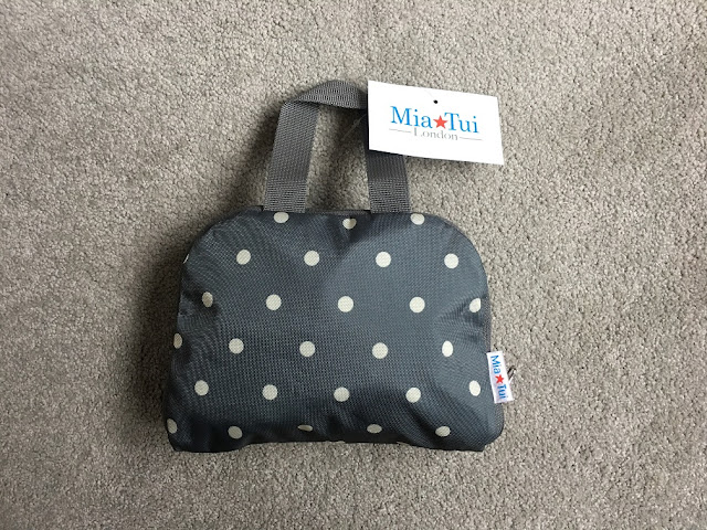 mia tui oxford backpack folded up