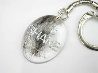 Pet hair keepsake keyring with paw print