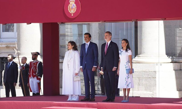 Queen Letizia wore a white Aline embroidered short sleeve dress by Carolina Herrera. Sheikha Jawaher Bint Hamad Bin Suhaim