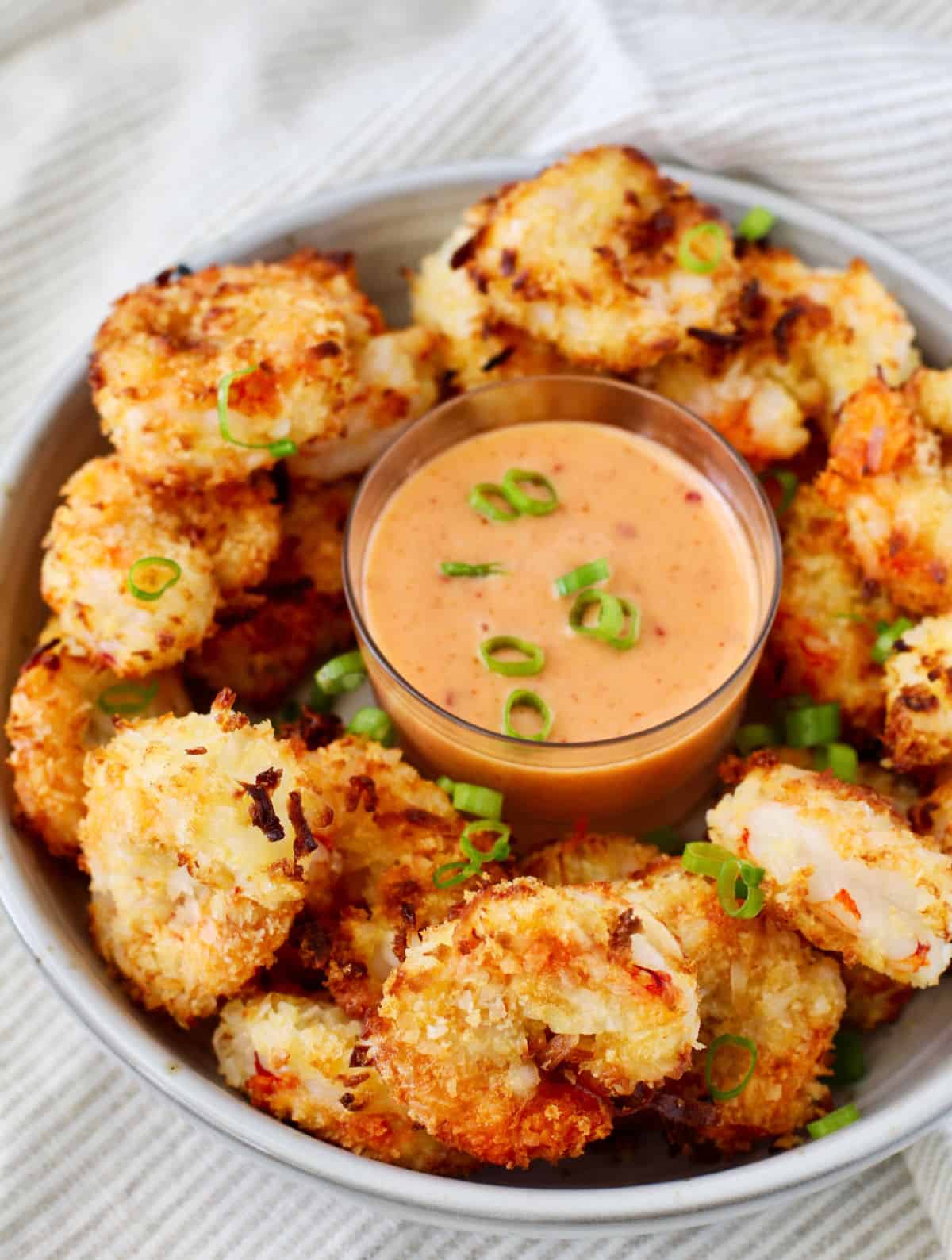 Air Fryer Crispy Coconut Shrimp with dipping sauce.