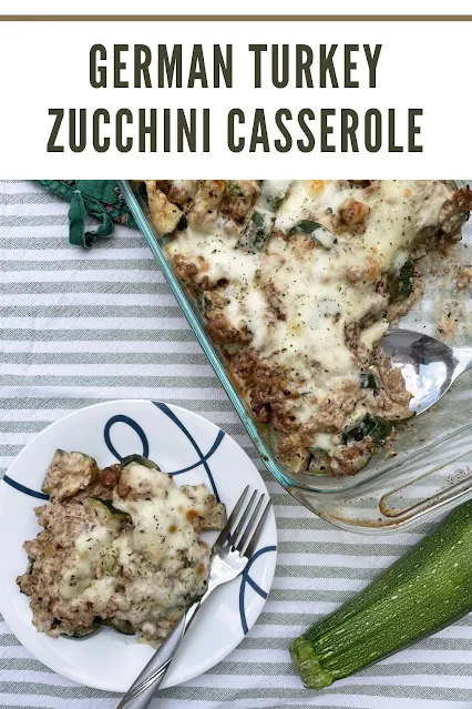 Baking dish of German turkey zucchini casserole with some on a serving plate.