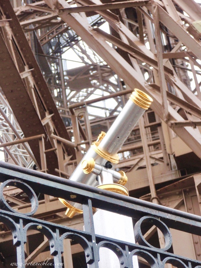 Eiffel Tower gold and silver telescopes on the second floor and top floor offer closer views of the city below