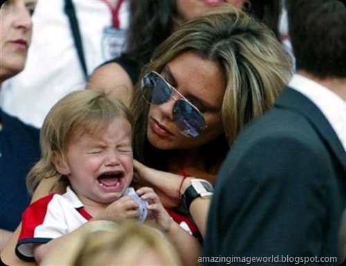 Victoria Beckham comforts her son 001