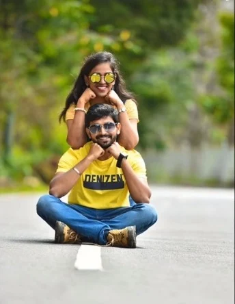 husband and wife on road photography pose