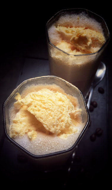 "Creamy Coffee Milkshake with Homemade Coffee Syrup and Vanilla Ice Cream: A delightful coffee lover's treat."