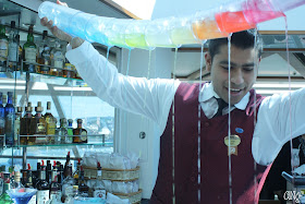 Jorge mid-pour on the impressive rainbow martini | Anyonita-nibbles.co.uk