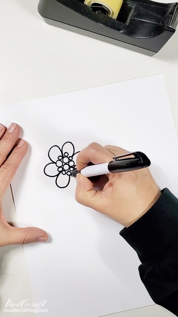 Step 1: Draw   Begin by drawing your favorite designs, art or images on a piece of paper. This can be as detailed as desired, but start with a simple one, so you know how it all comes together at the end.