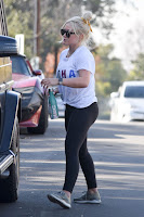 Hillary Duff in Tights and White T-Shirt