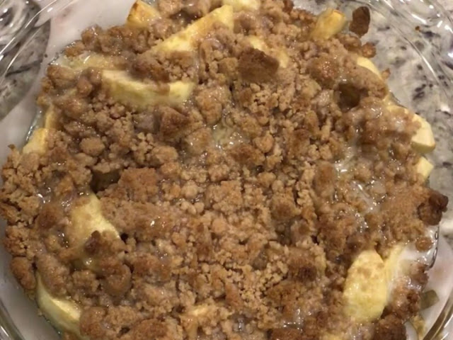 Apple Crisp baked in the oven with cinnamon brown sugar butter and apples