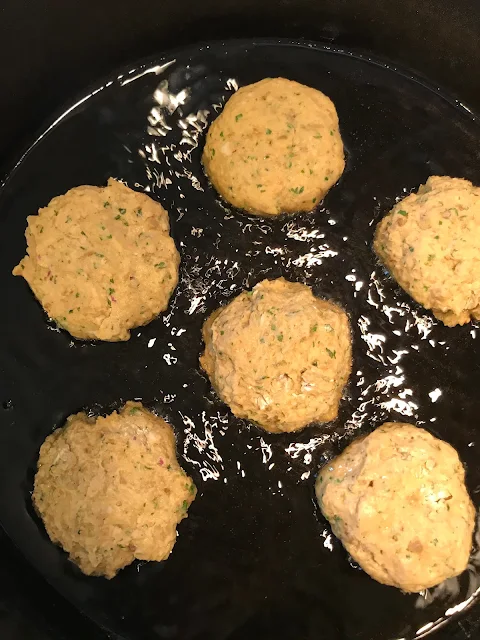 Frying Eggplant and chickpea fritters.