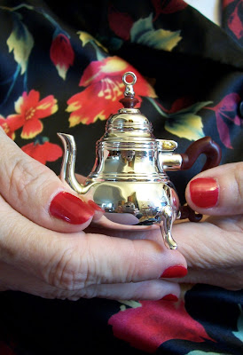 Stef's photo of a tiny silver teapot