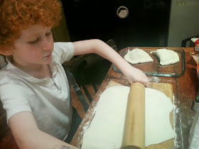 six year old cooking making a pie