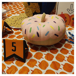 Photo of pumpkin decorated as a donut