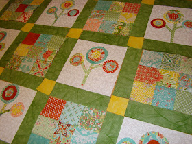 Bloom Where You Are Planted raw edge applique flower quilt