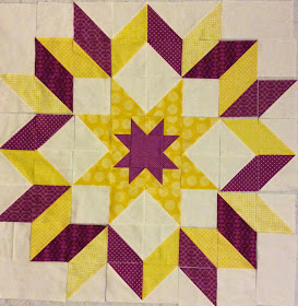 The Starburst Quilt plum and yellow