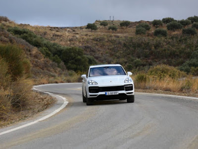 2019 Porsche Cayenne front driving on road