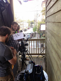 Jordan Lewis, Fred Mince, and Dan Jones prep gear to film at Joey K's