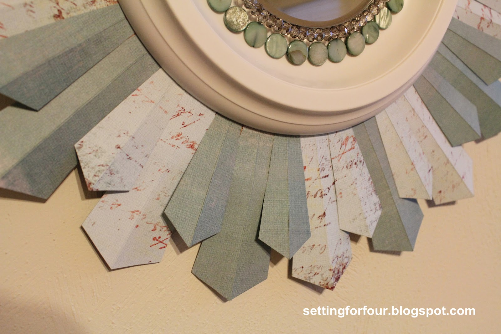 Attach the ceiling medallion with hot glue so that it is centered onto ...