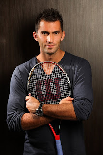 Simona Halep Boyfriend Horia Tecau Posing With His Tennis Racket 