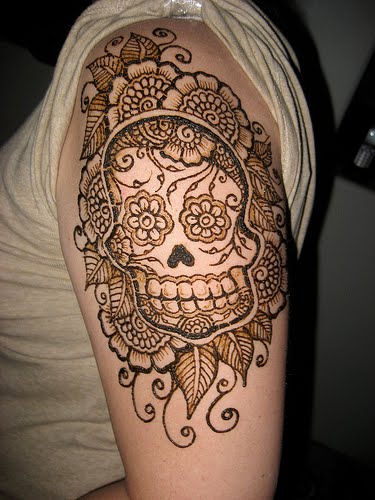 Aztec inspired quarter tattoo Voodoo skull and vegetation art
