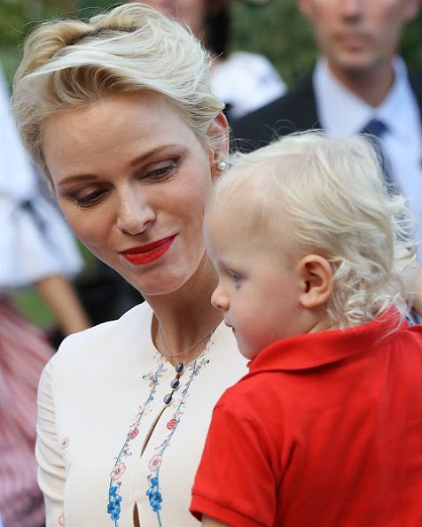 Prince Albert, Princess Charlene attend a dance show with Prince Jacques, the heir apparent to the Monegasque throne during the traditional Monaco's picnic - Pique Nique Monegasque at Le Parc Princesse Antoinette