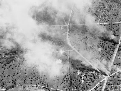 German vehicles burning on a road in the Falaise area in France after coming under attack by aircraft of the 2nd Tactical Air Force on the 19th of August 1944