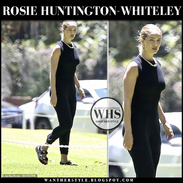 Rosie Huntington-Whiteley in black tank top and black sweatpants
